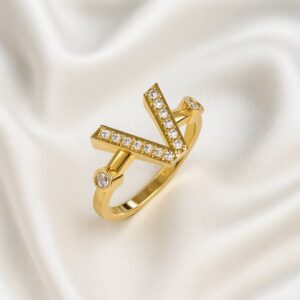 ANEL DE LIGA DA MOEDA, LETRA