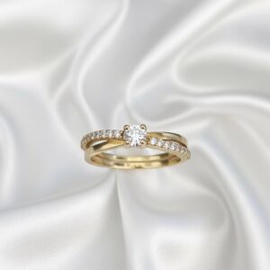 Anel Liga da Moeda formato de x com pedras de zircônia